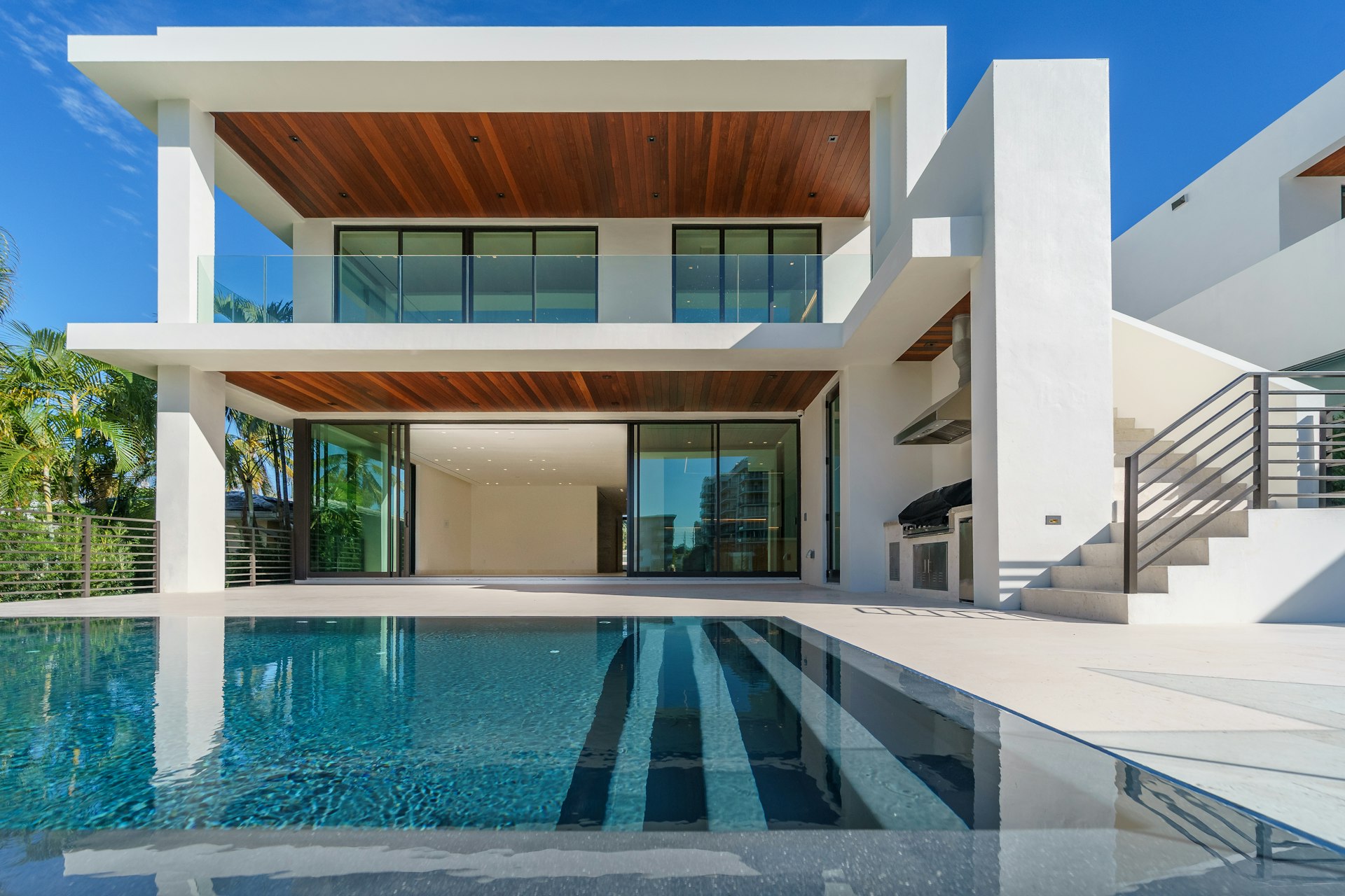 Luxury South Florida waterfront home exterior at twilight